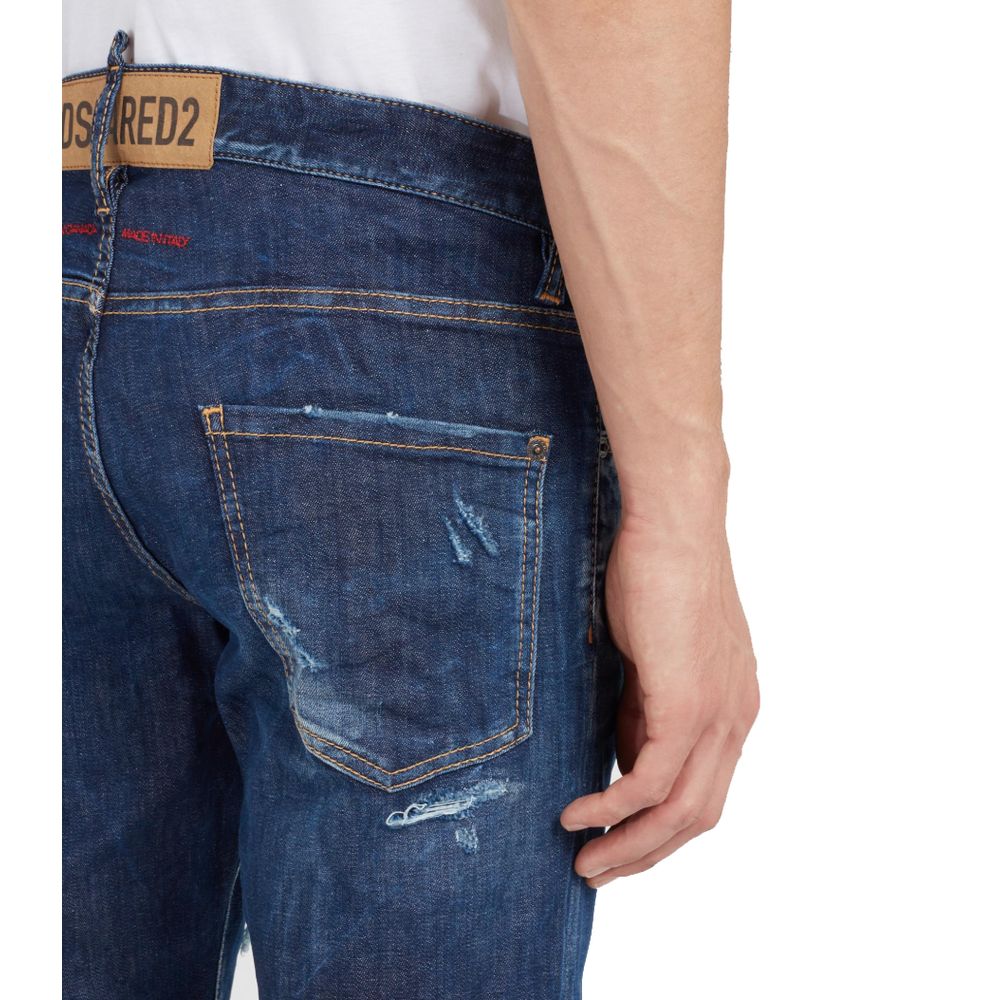 Blue Cotton Men JeansElevate your denim game with Dsquared²’s Cool Guy jeans, the epitome of rugged sophistication. Crafted in Italy, these jeans showcase edgy distressing and a tasteful fade for that perfectly worn-in look. A logo patch on the rear ensur