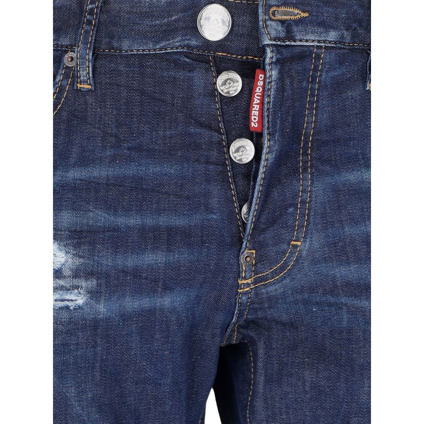 Blue Cotton Men JeansElevate your denim game with Dsquared²’s Cool Guy jeans, the epitome of rugged sophistication. Crafted in Italy, these jeans showcase edgy distressing and a tasteful fade for that perfectly worn-in look. A logo patch on the rear ensur