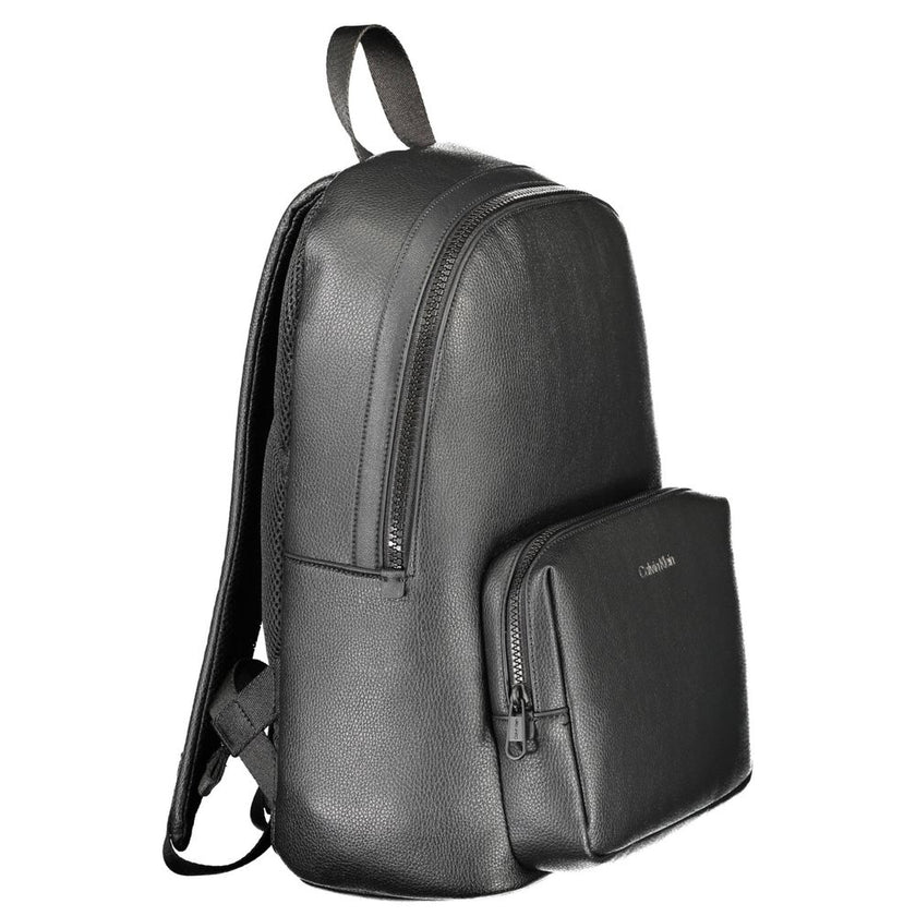 Black Polyethylene Men BackpackElevate your on-the-go style with the sleek Calvin Klein backpack, expertly crafted to keep pace with the dynamic lifestyle of the modern man. The bold black hue complements the minimalist design, featuring an external pocke