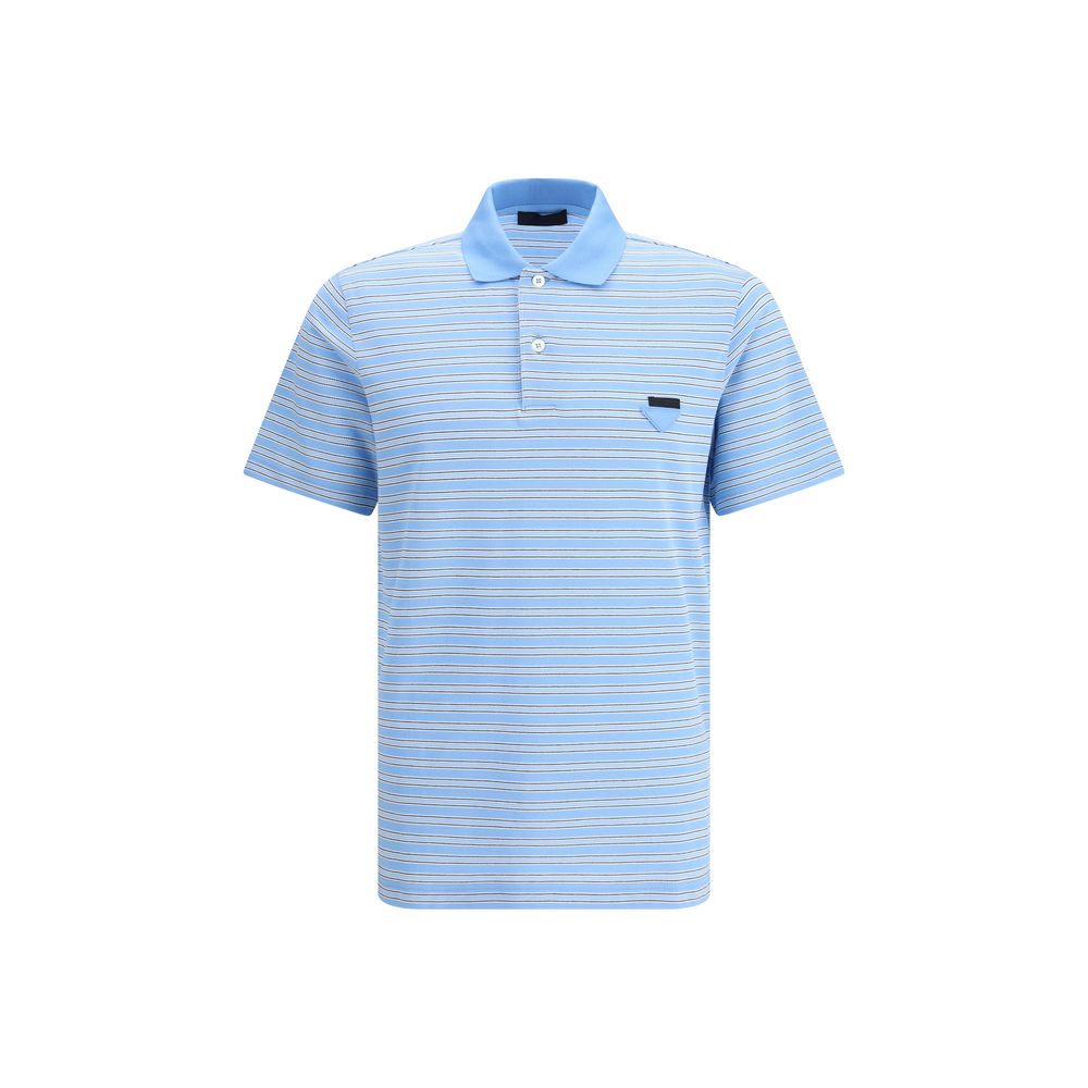 Light Blue Cotton Polo ShirtPrada’s Striped Polo Sweater combines a sporty style with the Maison’s iconic details. With a classic collar and three-button front closure, it is embellished with the unmistakable triangular patch on the front and a signature