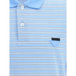 Light Blue Cotton Polo ShirtPrada’s Striped Polo Sweater combines a sporty style with the Maison’s iconic details. With a classic collar and three-button front closure, it is embellished with the unmistakable triangular patch on the front and a signature