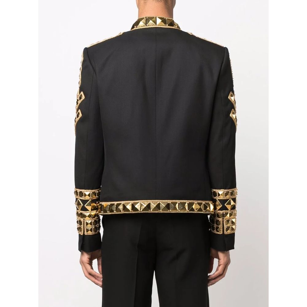 Black Acetate Men's BlazerMake a powerful statement with this exquisitely structured Balmain black blazer. Its gold-tone stud embellishments inject a dose of fearless attitude into your wardrobe, while the sharp, tailored cut ensures an impeccable silhoue