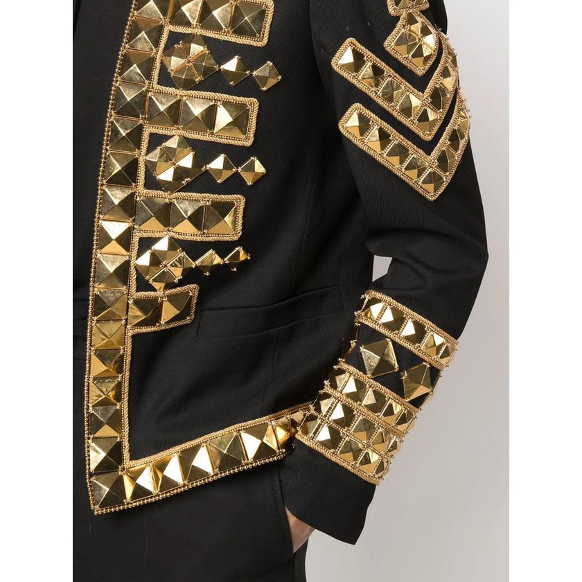 Black Acetate Men's BlazerMake a powerful statement with this exquisitely structured Balmain black blazer. Its gold-tone stud embellishments inject a dose of fearless attitude into your wardrobe, while the sharp, tailored cut ensures an impeccable silhoue