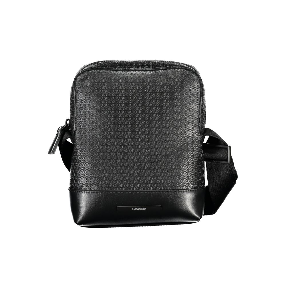 Elegant Black Shoulder Bag with Contrasting AccentsImmerse in the sophistication of Calvin Klein with this elegant black shoulder bag, perfect for the modern man on the move. Designed with functionality and style in mind, it features an adjustable shoulde