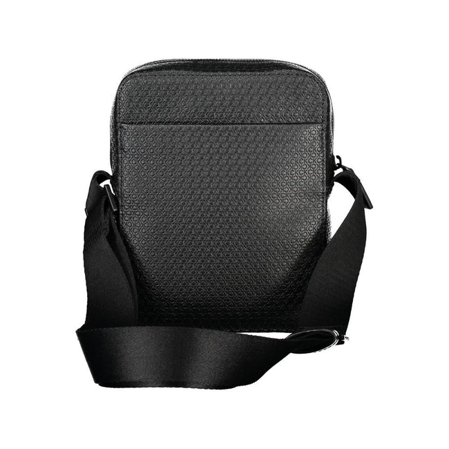 Elegant Black Shoulder Bag with Contrasting AccentsImmerse in the sophistication of Calvin Klein with this elegant black shoulder bag, perfect for the modern man on the move. Designed with functionality and style in mind, it features an adjustable shoulde