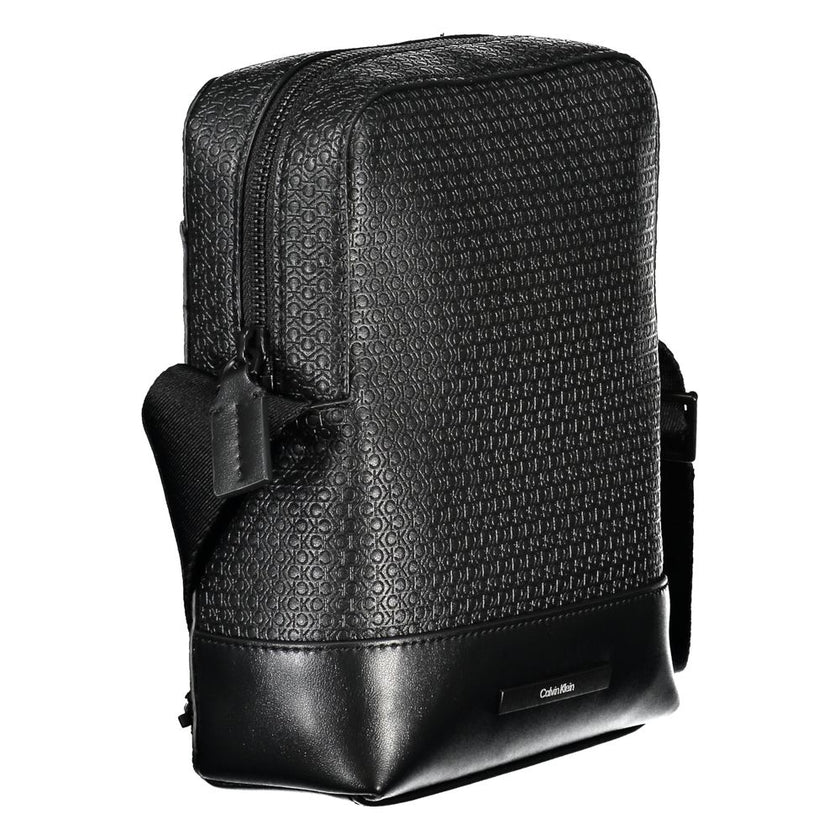 Elegant Black Shoulder Bag with Contrasting AccentsImmerse in the sophistication of Calvin Klein with this elegant black shoulder bag, perfect for the modern man on the move. Designed with functionality and style in mind, it features an adjustable shoulde