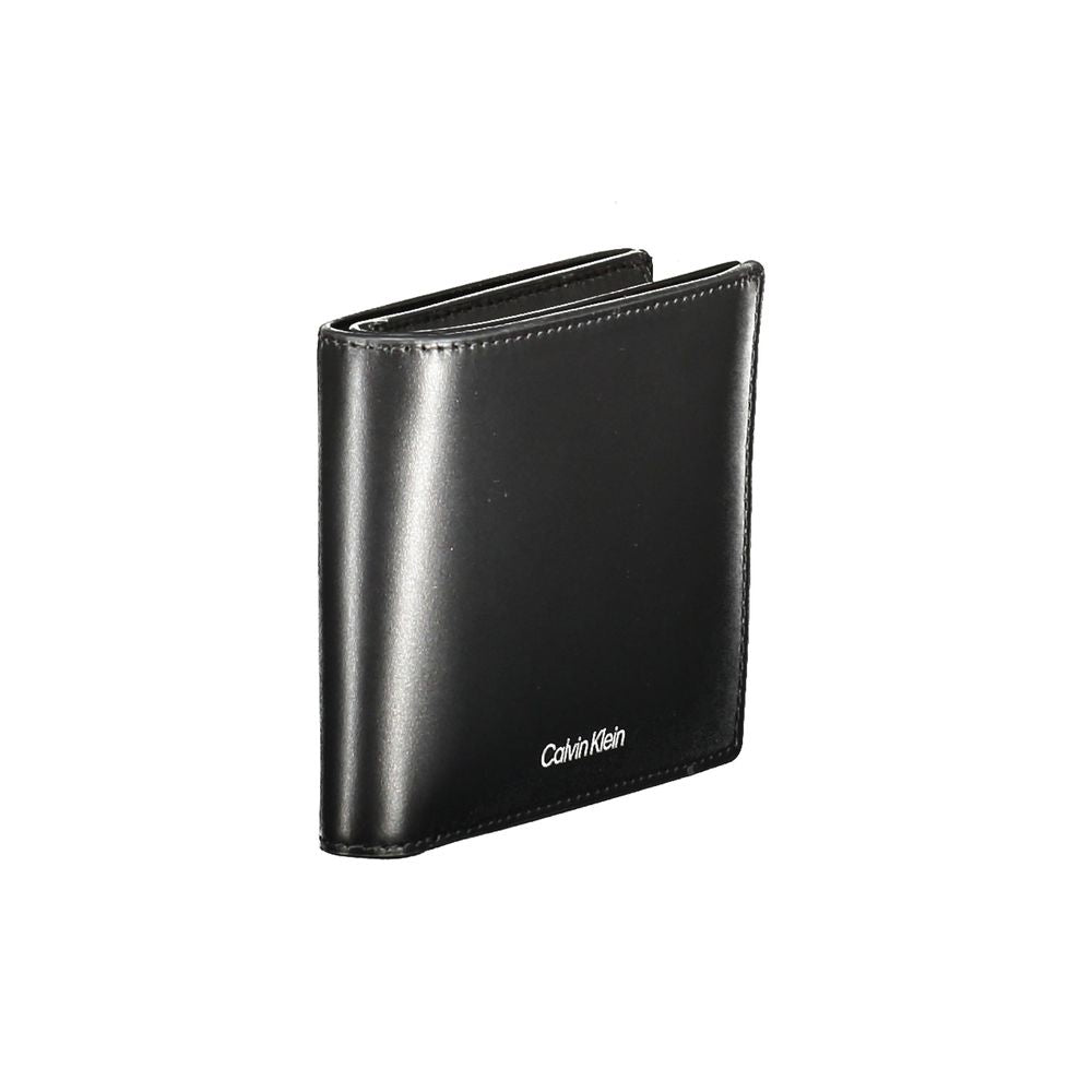 Black Leather Men WalletExperience the epitome of sleek sophistication with this impeccably crafted Calvin Klein wallet. Designed for the modern man who appreciates both style and security, this wallet boasts a streamlined silhouette with intelligent RFID