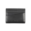 Elegant Leather Card Holder in Timeless BlackStreamline your essentials with this sleek and sophisticated leather card holder from Calvin Klein. Perfect for the minimalist, it features a central pocket designed to hold your cards securely while the iconic