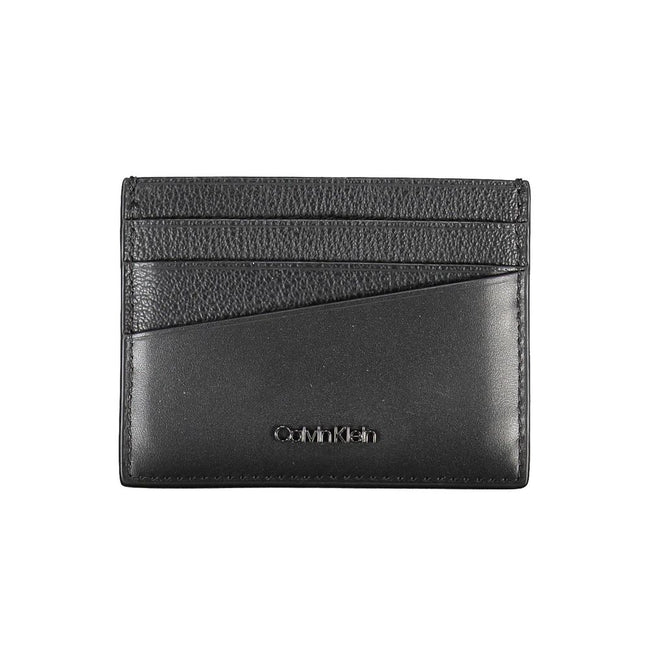 Elegant Leather Card Holder in Timeless BlackStreamline your essentials with this sleek and sophisticated leather card holder from Calvin Klein. Perfect for the minimalist, it features a central pocket designed to hold your cards securely while the iconic