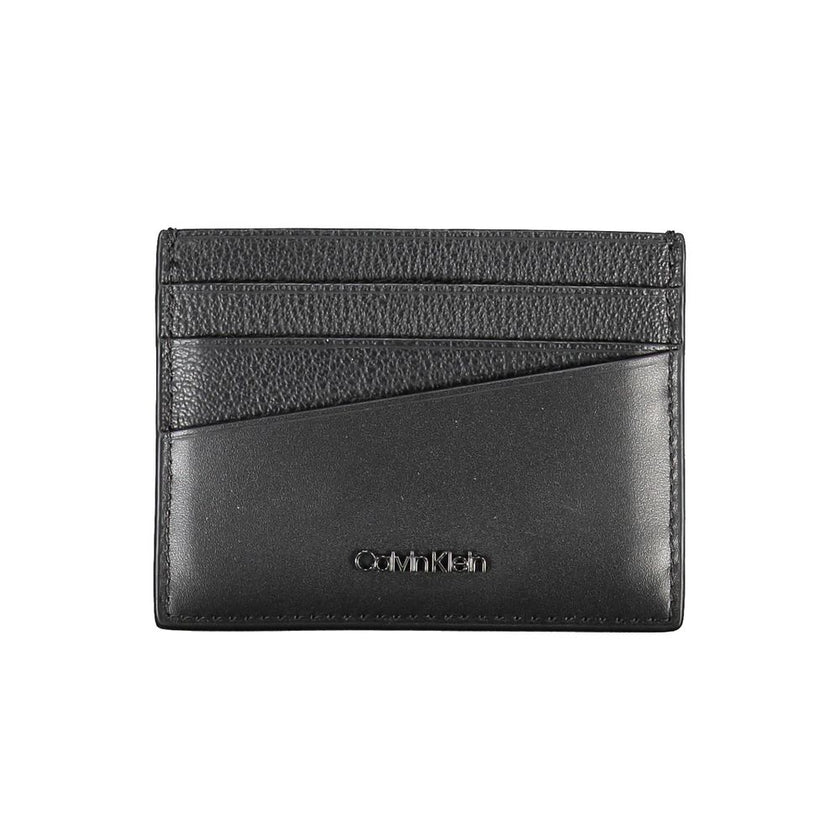 Elegant Leather Card Holder in Timeless BlackStreamline your essentials with this sleek and sophisticated leather card holder from Calvin Klein. Perfect for the minimalist, it features a central pocket designed to hold your cards securely while the iconic