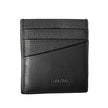 Elegant Leather Card Holder in Timeless BlackStreamline your essentials with this sleek and sophisticated leather card holder from Calvin Klein. Perfect for the minimalist, it features a central pocket designed to hold your cards securely while the iconic