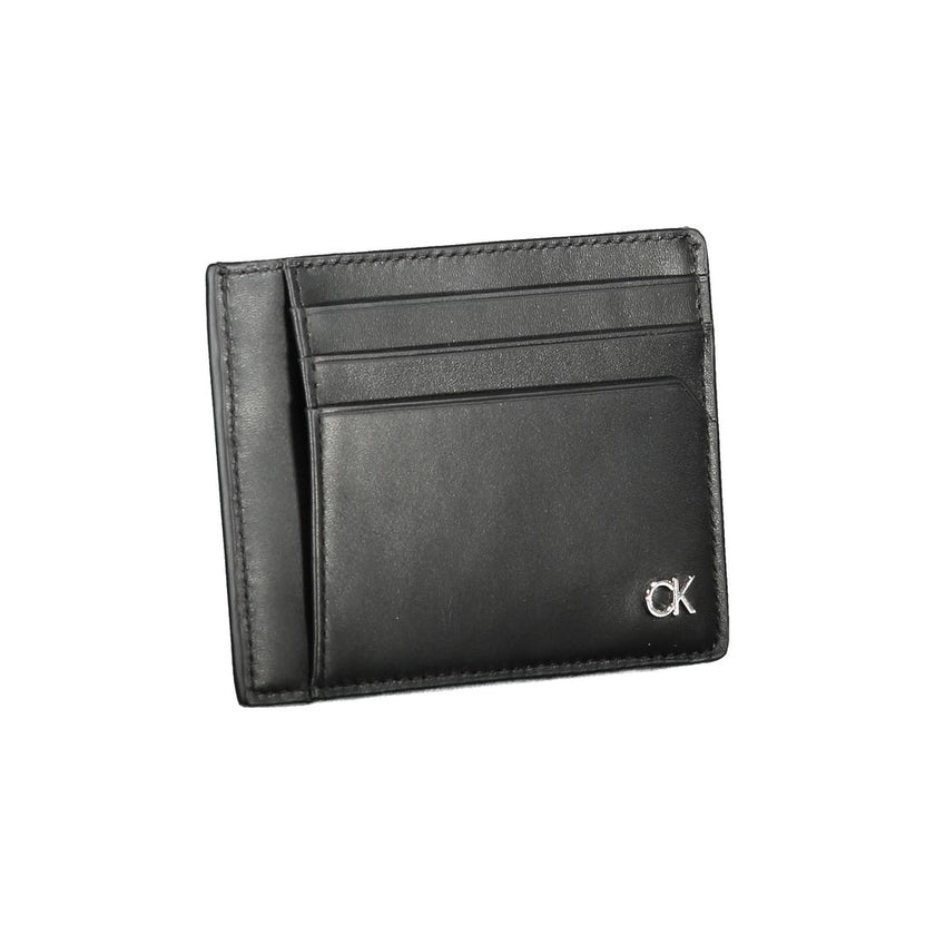 Black Leather WalletCARD HOLDER, 1 COMPARTMENT, 1 COIN POCKET, SPACES FOR CARDS, LOGOBlack Leather Wallet${tagsCalvin KleinAulae Black Leather Wallet Calvin KleinAulae Black Leather Wallet CARD HOLDER, 1 COMPARTMENT, 1 COIN POCKET, SPACES FOR CARDS, LOGO