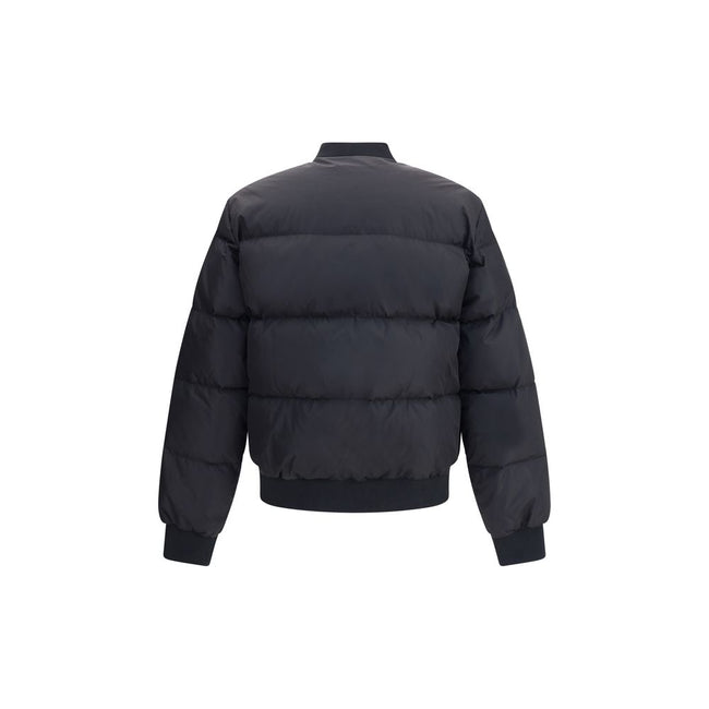 Black Polyamide BomberThe Easy Puffer Down Jacket by Dsquared2 is ideal for tackling the cold season in style. Featuring a quilted and padded design, it features a ribbed collar, cuffs and hem for a snug and comfortable fit. The double-slider front zipper
