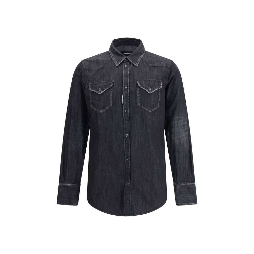 Black Denim ShirtDsquared2’s Classic Western Shirt reinterprets the iconic Western style with a contemporary twist. Made from cotton denim, it features a classic collar, front snap button closure and adjustable cuffs. The two flap patch pockets on the fro