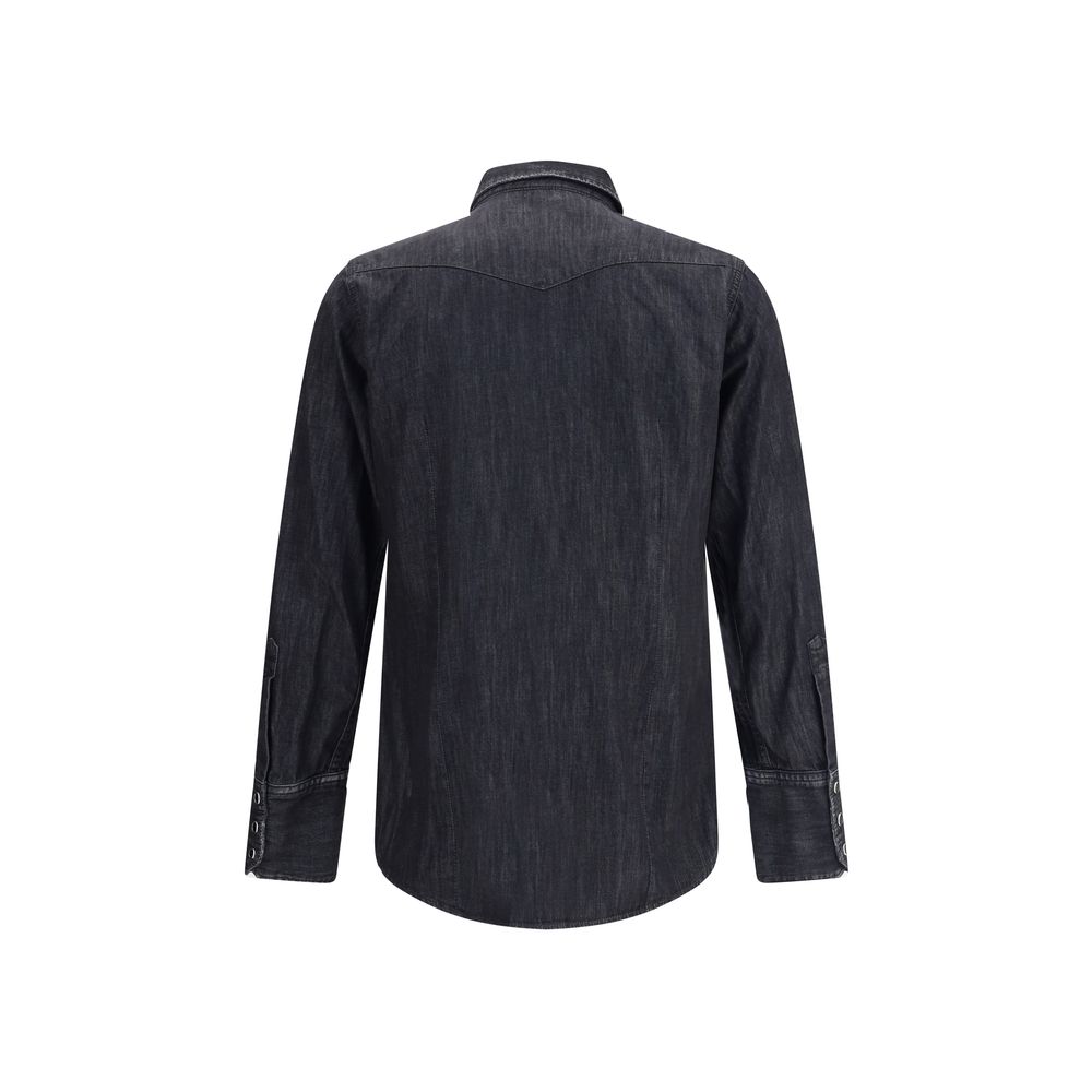 Black Denim ShirtDsquared2’s Classic Western Shirt reinterprets the iconic Western style with a contemporary twist. Made from cotton denim, it features a classic collar, front snap button closure and adjustable cuffs. The two flap patch pockets on the fro