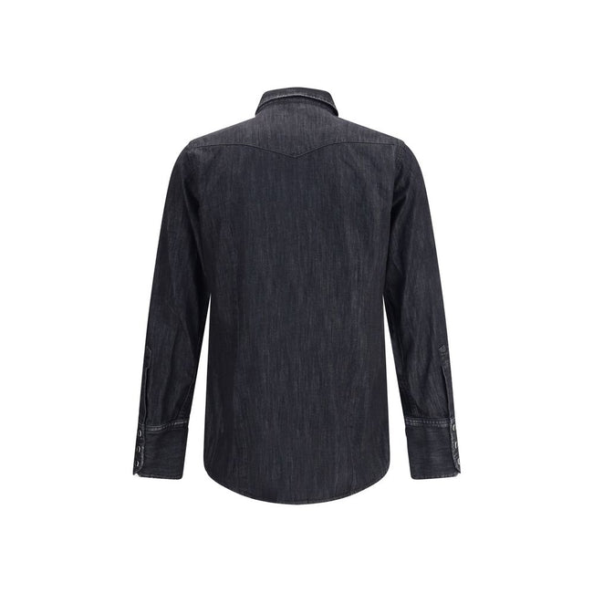 Black Denim ShirtDsquared2’s Classic Western Shirt reinterprets the iconic Western style with a contemporary twist. Made from cotton denim, it features a classic collar, front snap button closure and adjustable cuffs. The two flap patch pockets on the fro