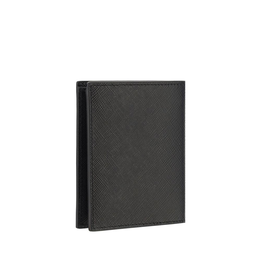 Black Calf Leather Bos Taurus WalletPrada’s Leather Wallet combines elegance and functionality in a refined billfold design. The front features a metal plaque with the iconic logo, while the interior is organized with card slots, two open pockets and a to