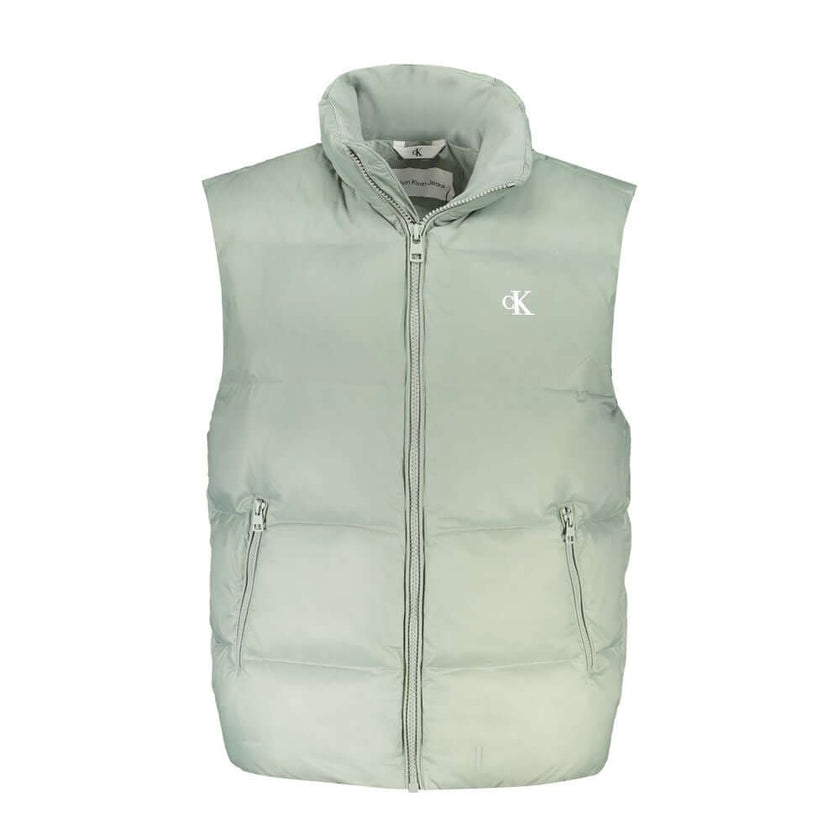 Green Polyamide Men JacketElevate your wardrobe with the Calvin Klein sleeveless jacket, meticulously crafted for the modern go-getter. This piece is not just about style, but also sustainability, with its 95% recycled polyester construction. Outfitted wi