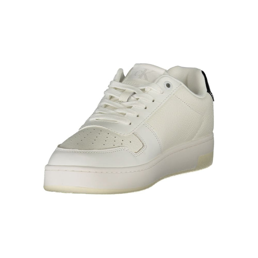 White Leather Women SneakerElevate your sneaker game with these effortlessly chic Calvin Klein sports shoes, designed for the fashion-forward individual. With striking black contrasts that pop against a pristine white background, these sneakers boast a re