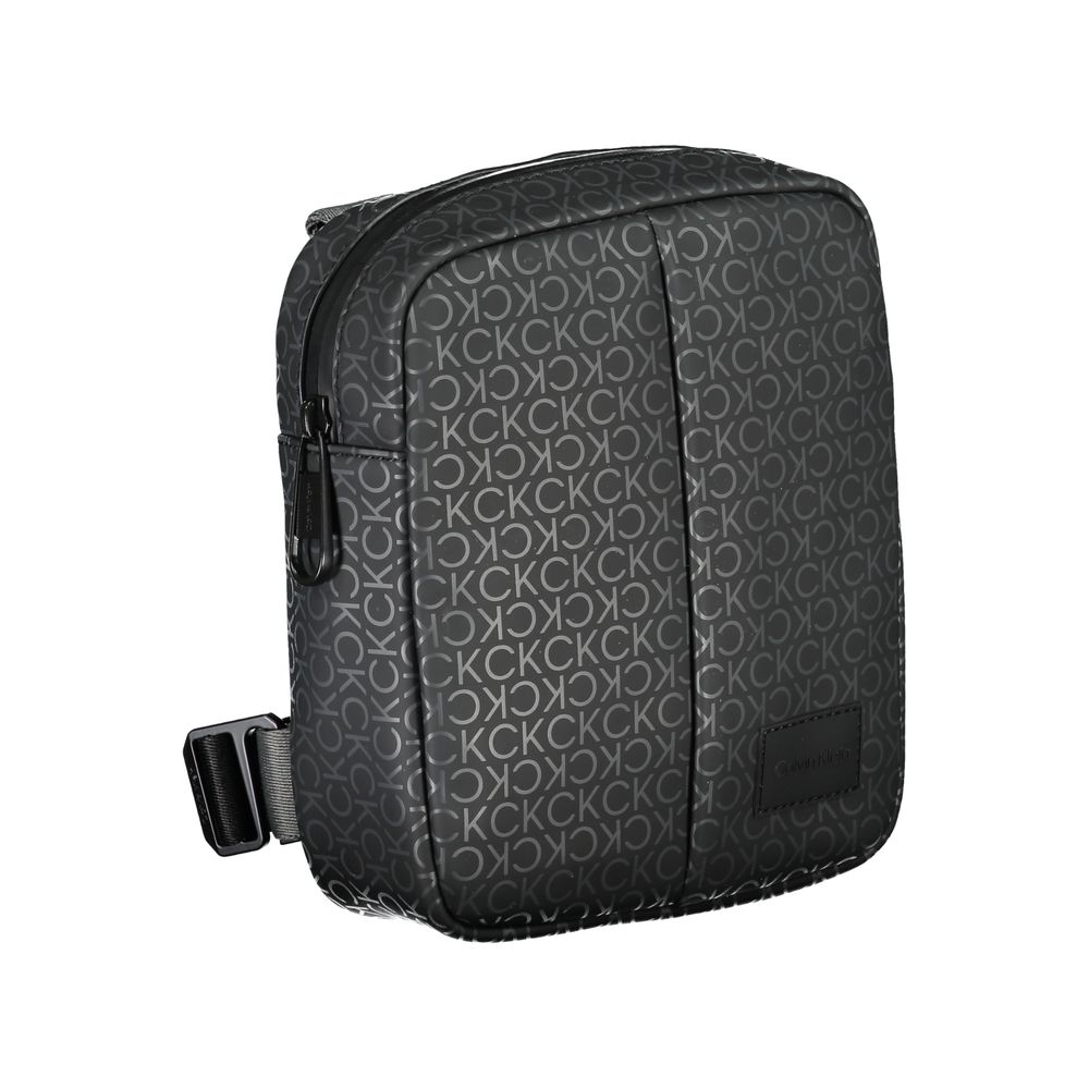 Eco-Conscious Black Shoulder BagDiscover the perfect blend of functionality and eco-conscious design with this Calvin Klein black shoulder bag. Featuring an adjustable shoulder strap for customizable comfort, a secure zip closure, and one internal pocket