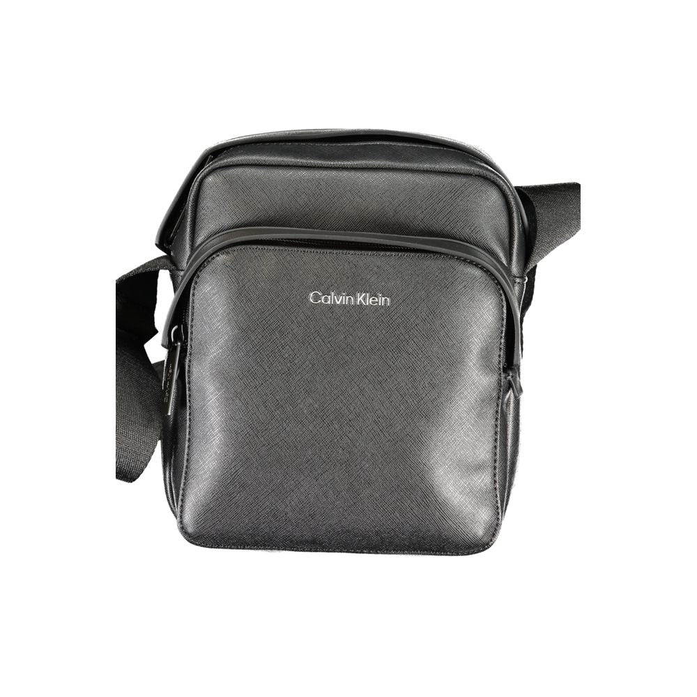 Black Polyester Shoulder BagADJUSTABLE SHOULDER STRAP, 1 EXTERNAL POCKET, 1 INTERNAL POCKET, ZIP CLOSURE, CONTRASTING DETAILS, LOGO, RECYCLED POLYESTERBlack Polyester Shoulder Bag${tagsCalvin KleinAulae Black Polyester Shoulder Bag Calvin KleinAulae Black