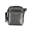 Black Polyester Shoulder BagADJUSTABLE SHOULDER STRAP, 1 EXTERNAL POCKET, 1 INTERNAL POCKET, ZIP CLOSURE, CONTRASTING DETAILS, LOGO, RECYCLED POLYESTERBlack Polyester Shoulder Bag${tagsCalvin KleinAulae Black Polyester Shoulder Bag Calvin KleinAulae Black