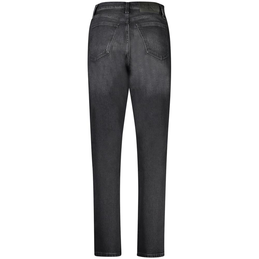 Black Cotton Women JeansDiscover the bold expression of timeless style with these Calvin Klein Mom Jeans. Crafted for those who covet a trendy yet classic silhouette, these jeans feature 5 pockets, a secure button and zip closure, and the iconic Calvin Kl