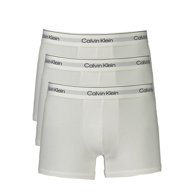 White Cotton Men BoxerElevate your essentials with Calvin Klein’s signature finesse. This tri-pack of Parigamba Shorty boxers blends style with unparalleled comfort, featuring an elastic waistband adorned with the iconic logo. With contrasting details for