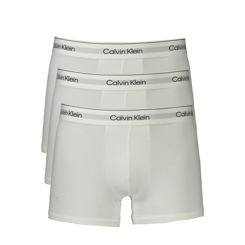 White Cotton Men BoxerElevate your essentials with Calvin Klein’s signature finesse. This tri-pack of Parigamba Shorty boxers blends style with unparalleled comfort, featuring an elastic waistband adorned with the iconic logo. With contrasting details for