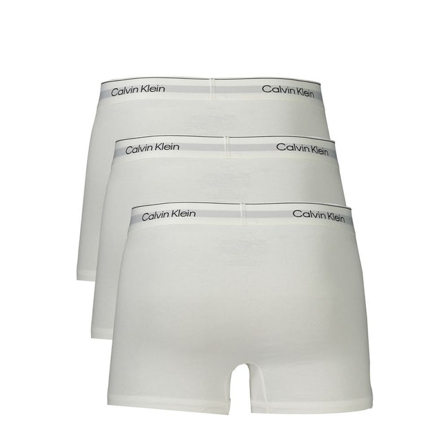 White Cotton Men BoxerElevate your essentials with Calvin Klein’s signature finesse. This tri-pack of Parigamba Shorty boxers blends style with unparalleled comfort, featuring an elastic waistband adorned with the iconic logo. With contrasting details for