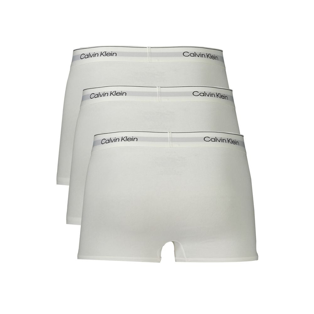 White Cotton Men Boxer ShortStep into the epitome of comfort and style with these sleek Calvin Klein low waist boxer shorts. Crafted with an eye for sustainable luxury, this tri-pack features the iconic branded elastic waistband, ensuring a snug fit and u