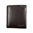 Brown Leather Men WalletElevate your daily essentials with this sleek Calvin Klein wallet, crafted from the finest 100% leather to ensure durability with a touch of sophistication. Featuring two spacious compartments, a handy coin purse, and ample slots f
