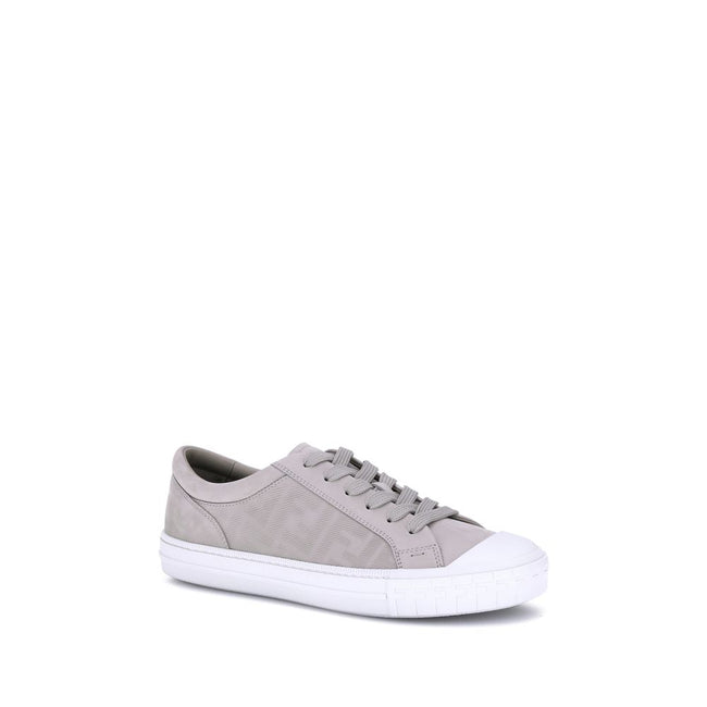 Beige Rubber Low Top SneakersThe Domino Sneakers by Fendi combine style and comfort with a modern and recognizable design. Featuring a round rubber toe and flat sole, they have a front lace-up closure. The all-over FF motif adds an iconic touch, making th
