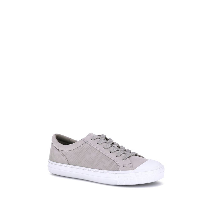 Beige Rubber Low Top SneakersThe Domino Sneakers by Fendi combine style and comfort with a modern and recognizable design. Featuring a round rubber toe and flat sole, they have a front lace-up closure. The all-over FF motif adds an iconic touch, making th