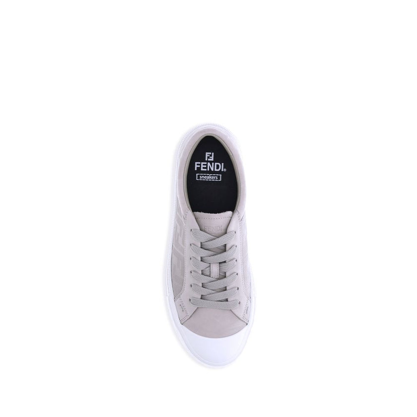 Beige Rubber Low Top SneakersThe Domino Sneakers by Fendi combine style and comfort with a modern and recognizable design. Featuring a round rubber toe and flat sole, they have a front lace-up closure. The all-over FF motif adds an iconic touch, making th