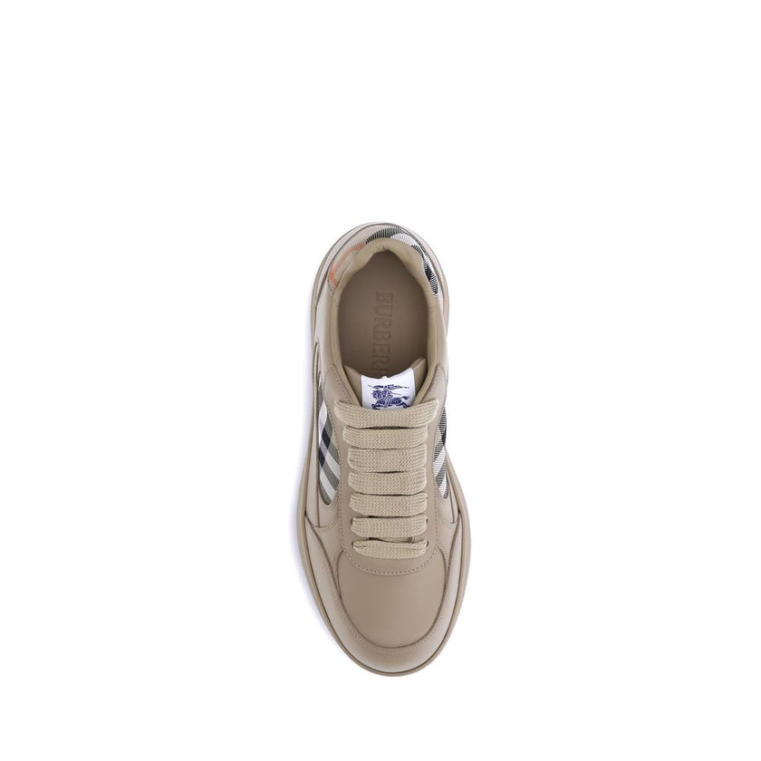 Beige Rubber Low Top SneakersBurberry’s Terrace Sneakers combine premium leather and the signature Check pattern in a sophisticated design. Featuring a padded ankle and a contrasting side panel woven with the classic Burberry Check in the signature sand c