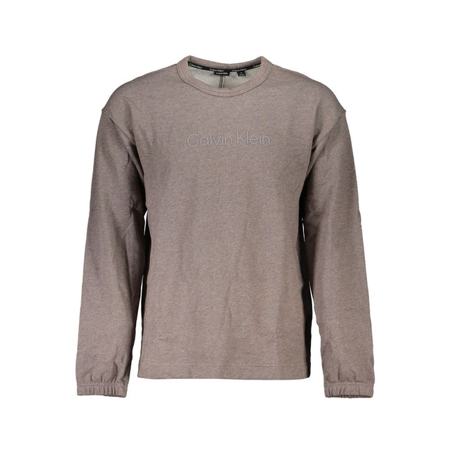 Brown Cotton Men SweaterUnleash your style with the quintessential boldness of Calvin Klein. This sweatshirt isn’t just a layer; it’s a statement with its striking logo print and sleek crew neck design. Crafted for both comfort and impact, it’s the go-to