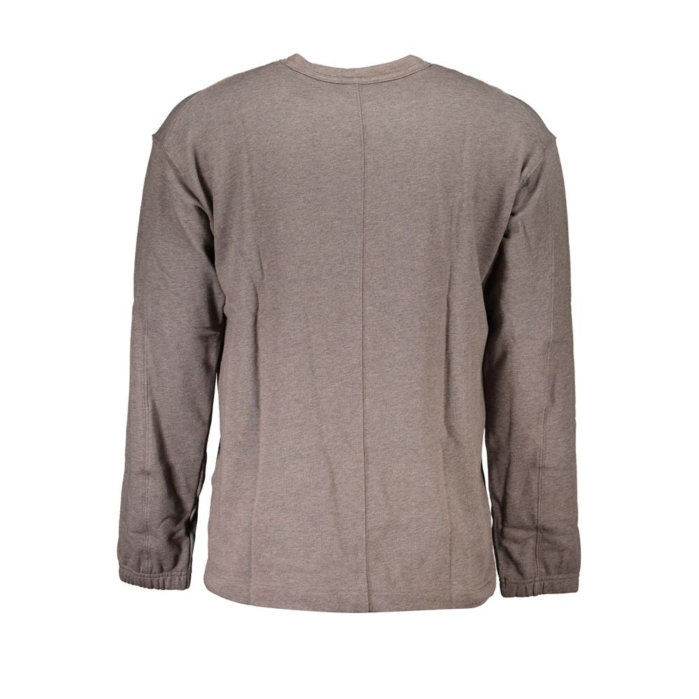 Brown Cotton Men SweaterUnleash your style with the quintessential boldness of Calvin Klein. This sweatshirt isn’t just a layer; it’s a statement with its striking logo print and sleek crew neck design. Crafted for both comfort and impact, it’s the go-to