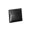 Sleek Black Leather Card HolderElevate your essentials with this sleek black card holder, designed to encapsulate elegance and functionality. Perfect for the discerning individual, this minimalist accessory ensures your cards are securely stored in style.