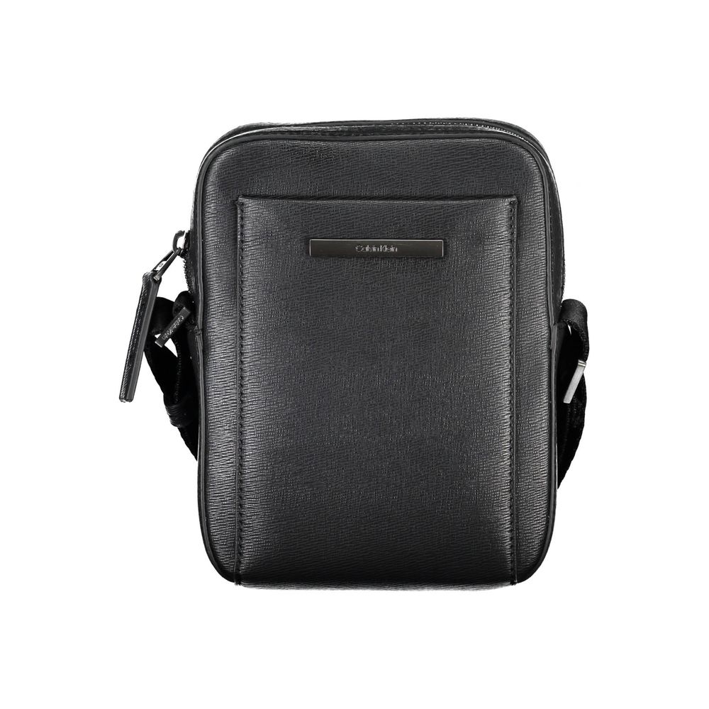 Elegant Black Shoulder Bag with Sleek DetailingExperience the perfect blend of functionality and style with this exquisite shoulder bag from the renowned Calvin Klein collection. Designed for the modern individual, it features an adjustable shoulder strap