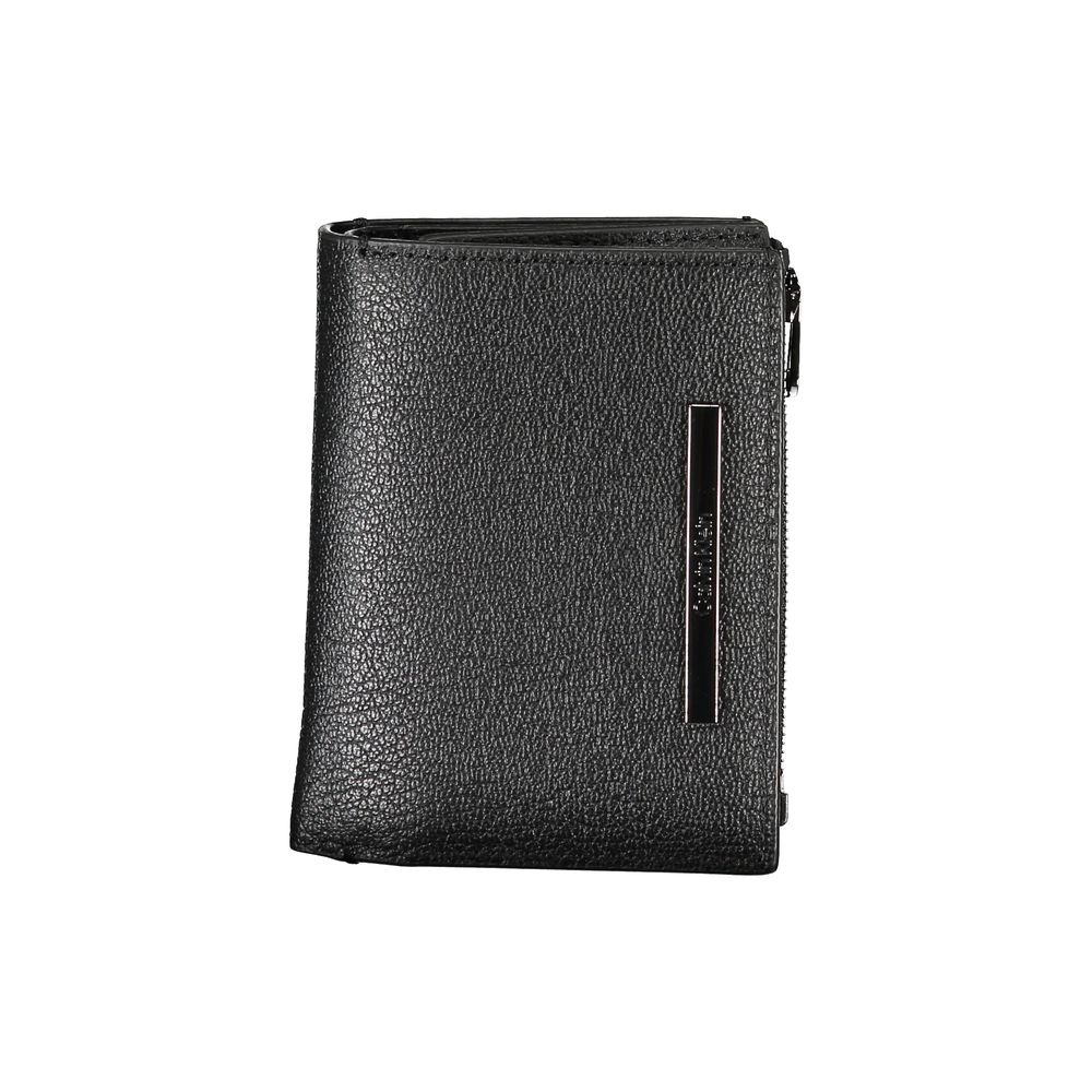Sleek Black Leather Wallet with Coin PurseDiscover the sophistication of Calvin Klein’s craftsmanship with this sleek black leather wallet. Designed for the modern man, this wallet features two spacious compartments to keep your essentials organized. A co