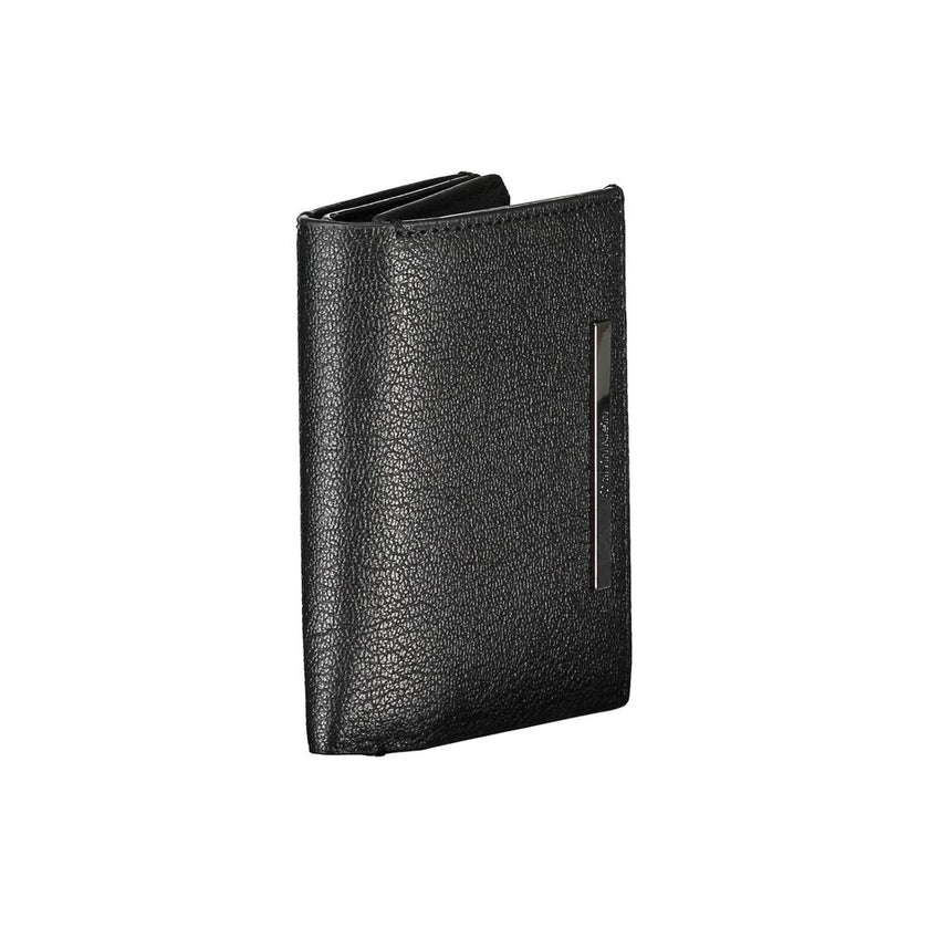 Sleek Black Leather Wallet with Coin PurseDiscover the sophistication of Calvin Klein’s craftsmanship with this sleek black leather wallet. Designed for the modern man, this wallet features two spacious compartments to keep your essentials organized. A co