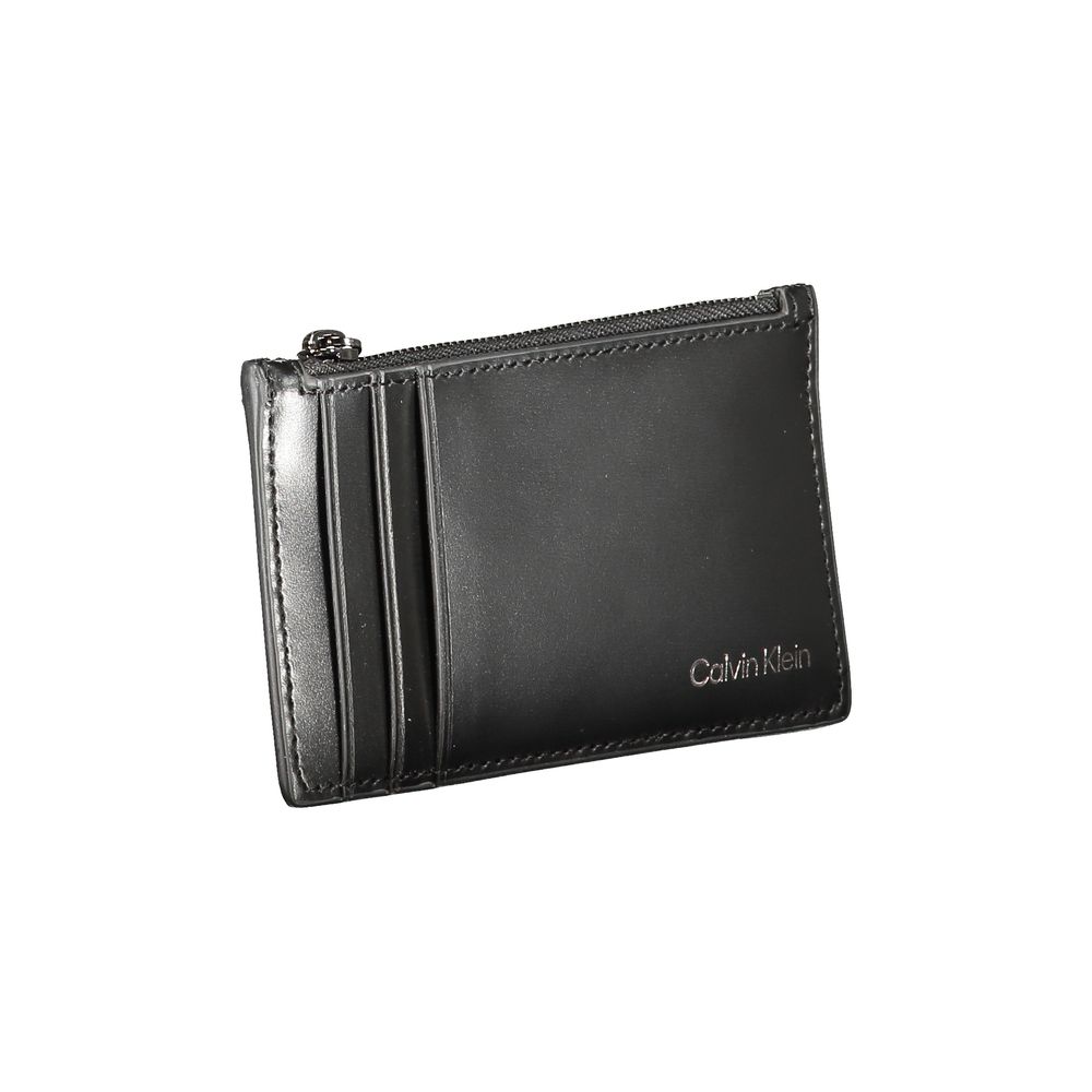 Black Leather WalletCARD HOLDER, 1 CENTRAL ZIP POCKET, SPACES FOR CARD, LOGOBlack Leather Wallet${tagsCalvin KleinAulae Black Leather Wallet Calvin KleinAulae Black Leather Wallet CARD HOLDER, 1 CENTRAL ZIP POCKET, SPACES FOR CARD, LOGO 110296138070,11273