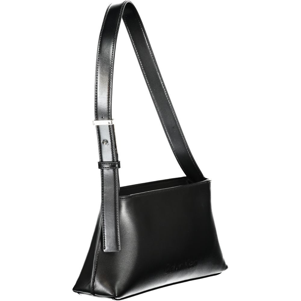 Black Polyester Women HandbagIndulge in the epitome of sleek sophistication with this Calvin Klein masterpiece. Exquisitely crafted with an eye for modernity, this handbag is your ideal accompaniment for a statement-making entrance. Featuring an adjustabl