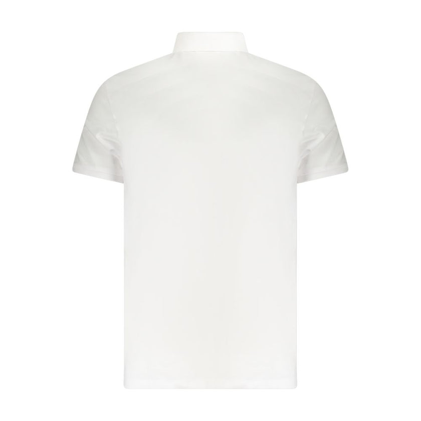 White Cotton Men Polo ShirtElevate your wardrobe with the epitome of timeless elegance – the Calvin Klein Classic Fit Polo. This crisp, white polo exudes sophistication with understated embroidery and the iconic logo adorning the chest. Crafted from a pre