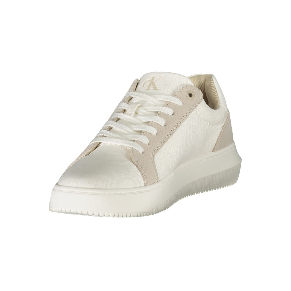 White Leather Men SneakerElevate your stride with the sleek sophistication of Calvin Klein’s latest sneaker creation. Seamlessly blending functionality with high-fashion, this sporty shoe dazzles with its sharp contrasting grey details and the unmistakabl