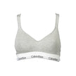 Brown Cotton Women BraletteElevate your intimate collection with the sophisticated charm of Calvin Klein. This bralette is a statement of style and comfort, infused with the classic appeal that the brand is revered for. Its chic crossed straps and elastic