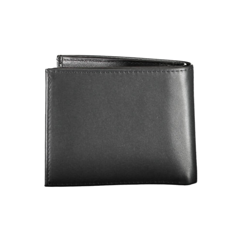 Black Leather Men WalletPresenting the ultimate fusion of sophistication and practicality – the Calvin Klein Leather Wallet. This sleek black accessory doesn’t just carry your essentials; it guards them too. With RFID blocking technology, your cards stay