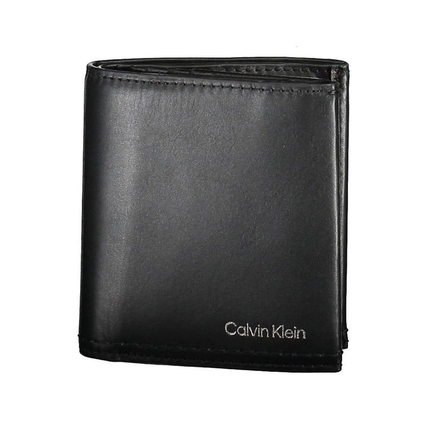 Black Leather Men WalletCrafted with the modern gentleman in mind, this Calvin Klein wallet is the epitome of sleek sophistication. A design that resonates with the brand’s minimalist aesthetic, it boasts two spacious compartments, a coin purse tailored f