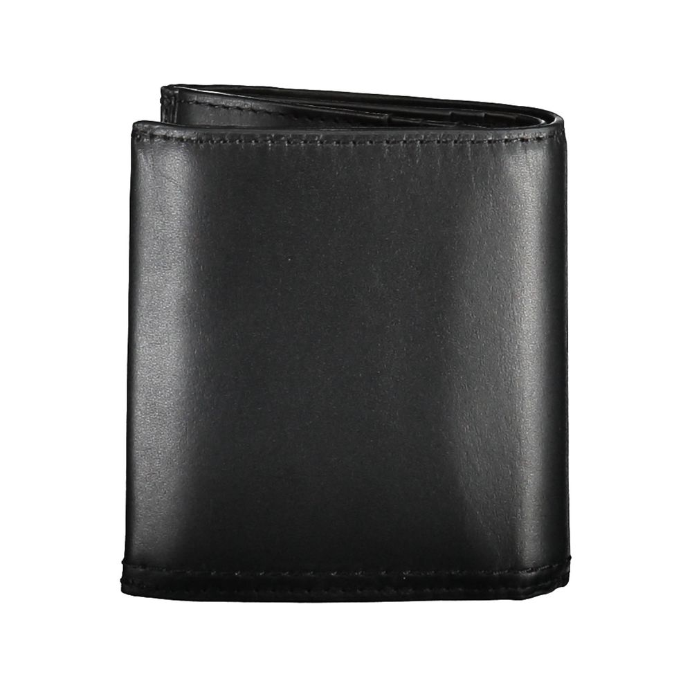 Black Leather Men WalletCrafted with the modern gentleman in mind, this Calvin Klein wallet is the epitome of sleek sophistication. A design that resonates with the brand’s minimalist aesthetic, it boasts two spacious compartments, a coin purse tailored f